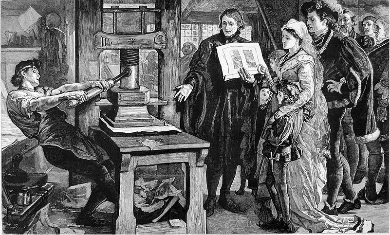 black and white image of a man turning an enormous screw to stamp an image onto paper using an early version of the printing press 